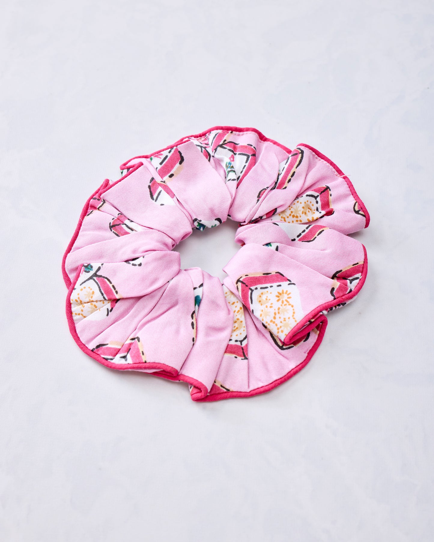 Peony pink scrunchie with multicolored Mah Jongg tile print and pink edging