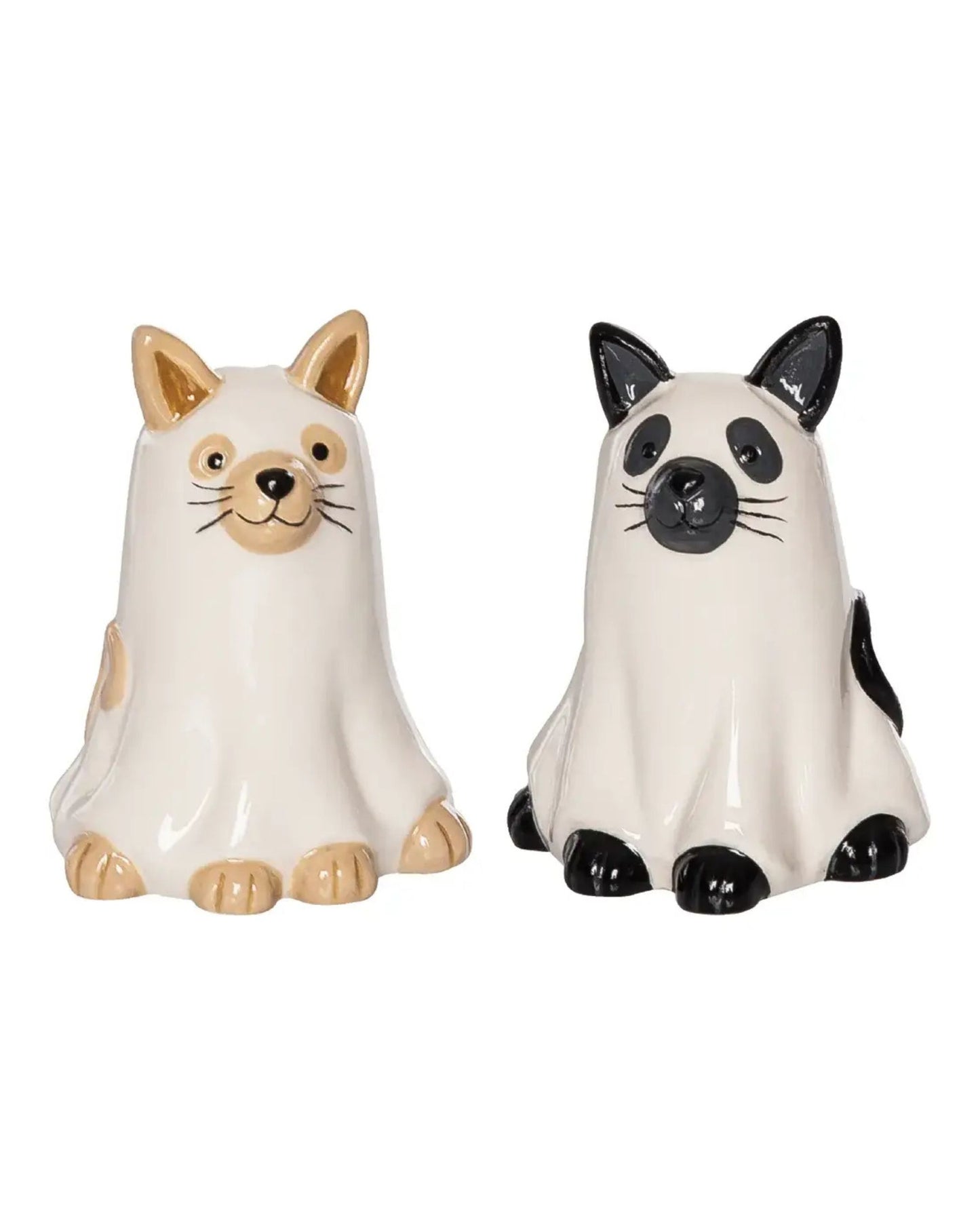 Set of two ceramic ghost-shaped cat salt and pepper shakers, one with tan markings and one with black markings.