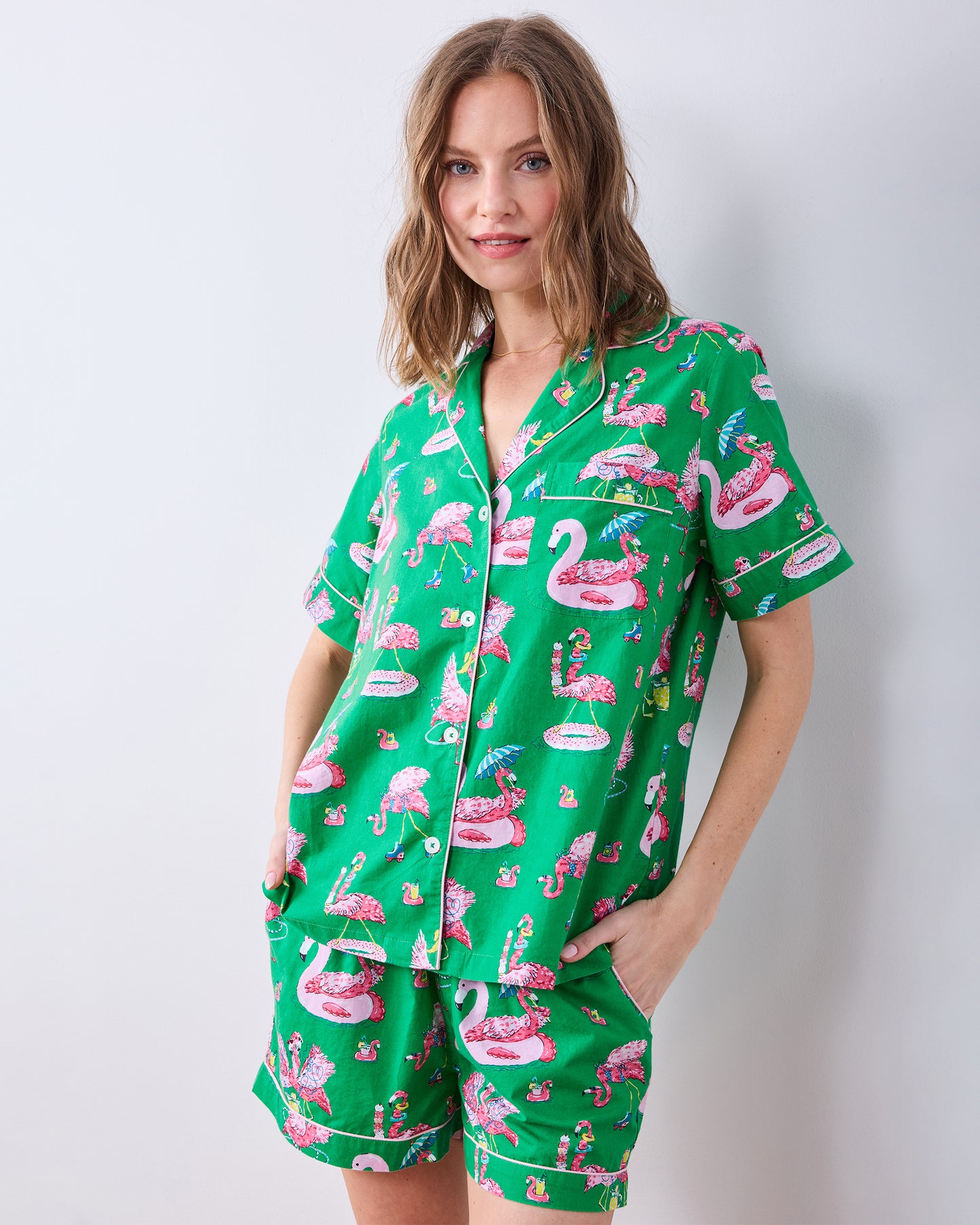 Front three-quarter view of the Palm Frond short pajama set with button-down top and shorts