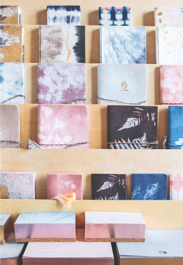 Fabric and paper pattern samples displayed in rows, illustrating Printfresh’s textile and stationery design work.