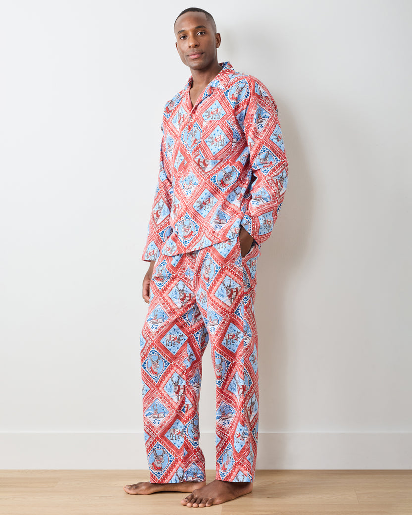 Front three-quarter view of Reindeer Games long pajama set with red framed reindeer print and button-front top