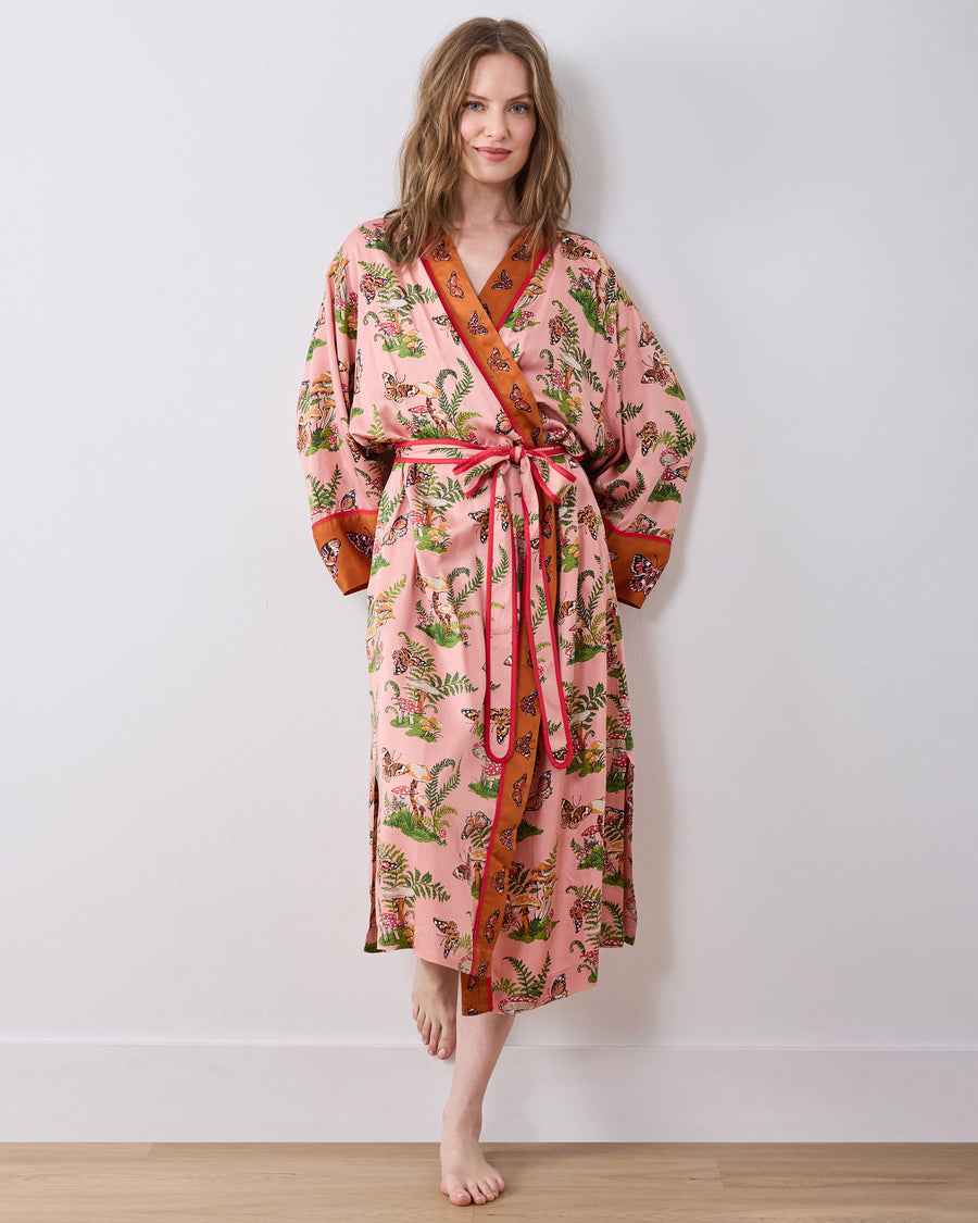 Full front view of the rosewood Butterfly Forager robe, showing its long wrap silhouette, matching belt, and printed design.
