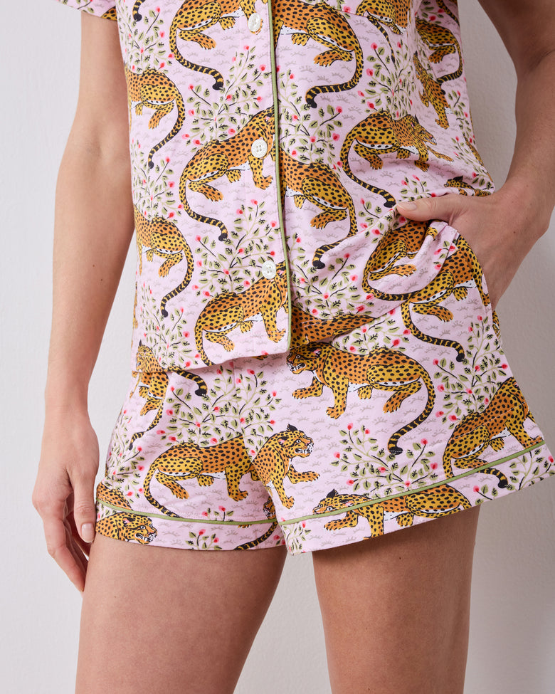 Close-up front view of the Bagheera blush short pajama set, showing its button-down top, shorts, pockets, and leopard print.