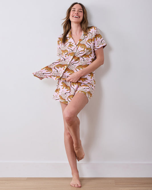 Front view of the Bagheera blush short pajama set with a button-down top and leopard print.