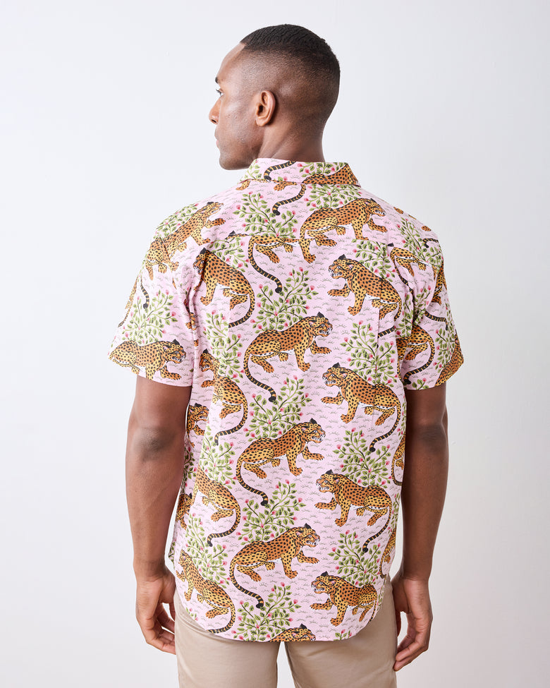 Back view of a model wearing the Blush Bagheera Leo Shirt