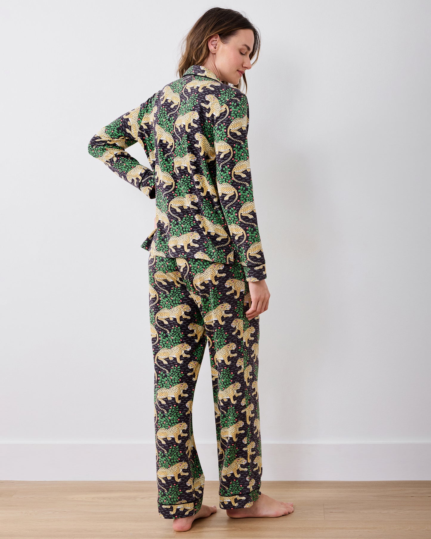 Back view of a person wearing the Bagheera long pajama set with a long-sleeved shirt and matching full-length pants.