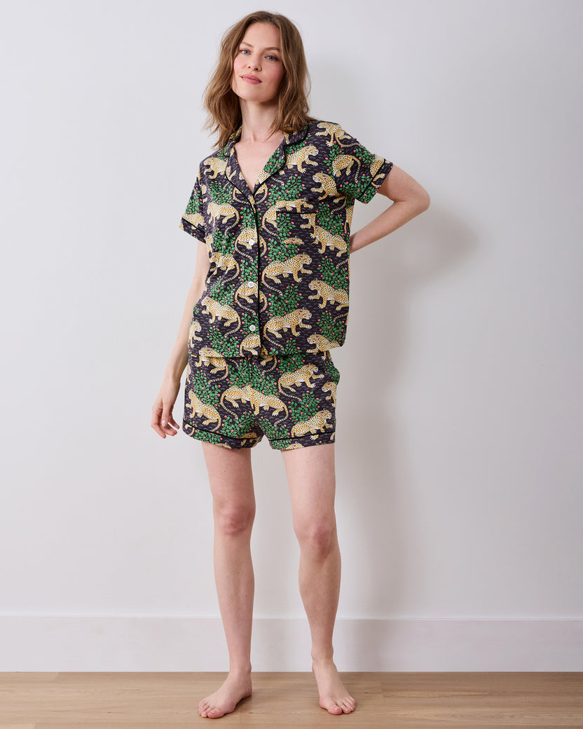 Person modeling the Bagheera short pajama set from the front, with a short-sleeved button-front shirt and matching shorts.