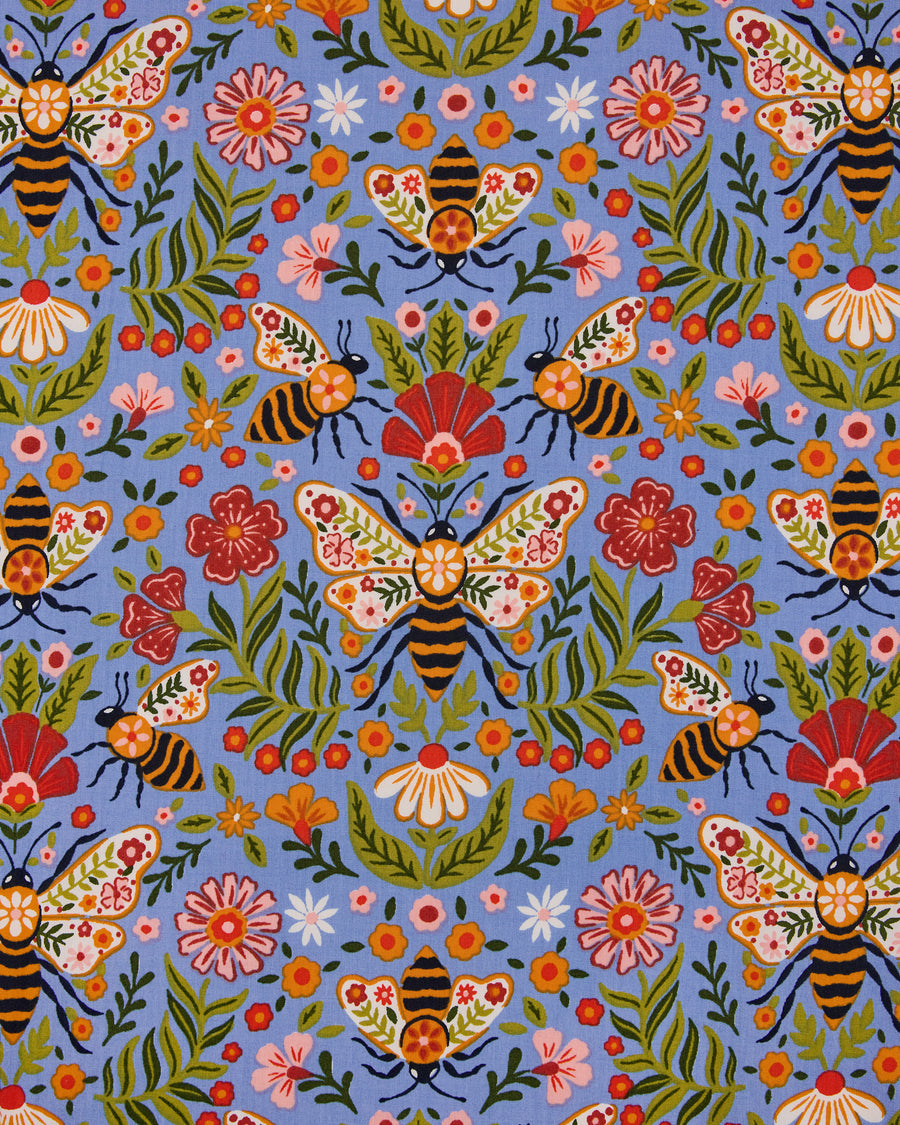 Close-up of the Delphinium Blue Bee Tapestry print, featuring illustrated bees, flowers, leaves, and tapestry-style wing patterns.