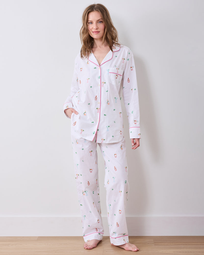 Front view of the Embroidered Tequila Sunrise long pajama set, with a button-front shirt and wide-leg pants covered in cocktail-themed embroidery.