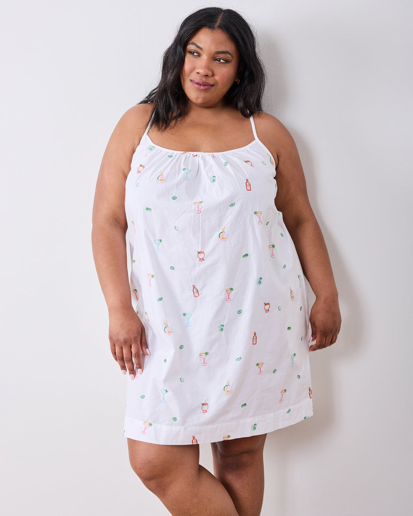 Front view of the Embroidered Tequila Sunrise cami nightgown on a plus-size model, showing its relaxed shape and cocktail-themed embroidery.