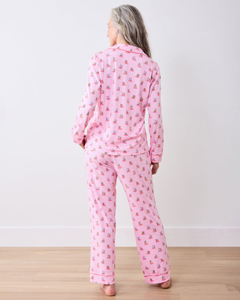 Full-length back view of a model wearing the pink Flamingo Floaties long pajama set