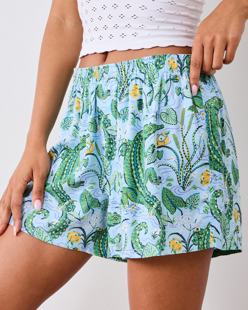 Close-up front view of the gator-print boxer shorts and gathered elastic waistband