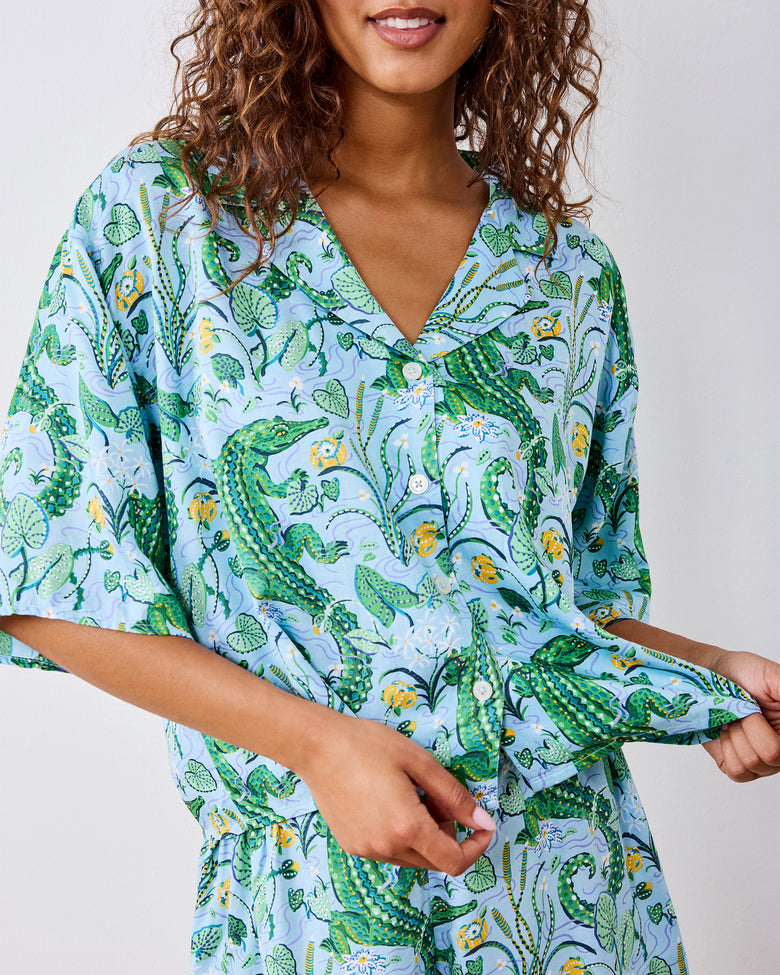 Front close-up of the Blue Lagoon pajama top with the hem held outward