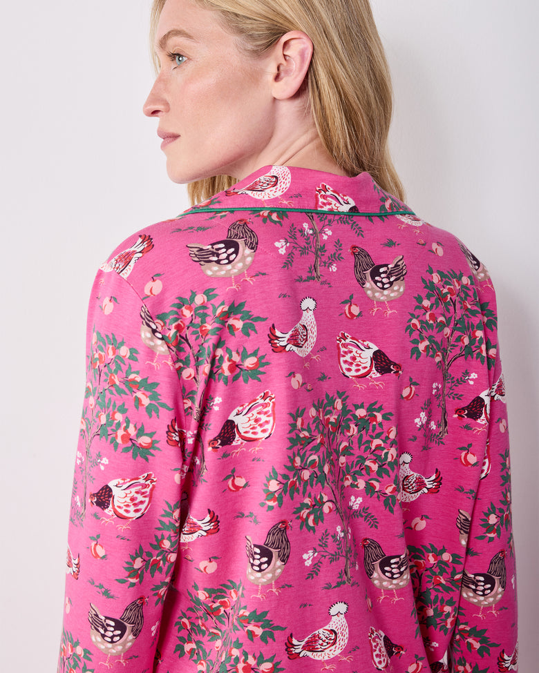 Close back view of the Rose Pop Hen House pajama top, showing the collar piping and chicken-and-floral print.