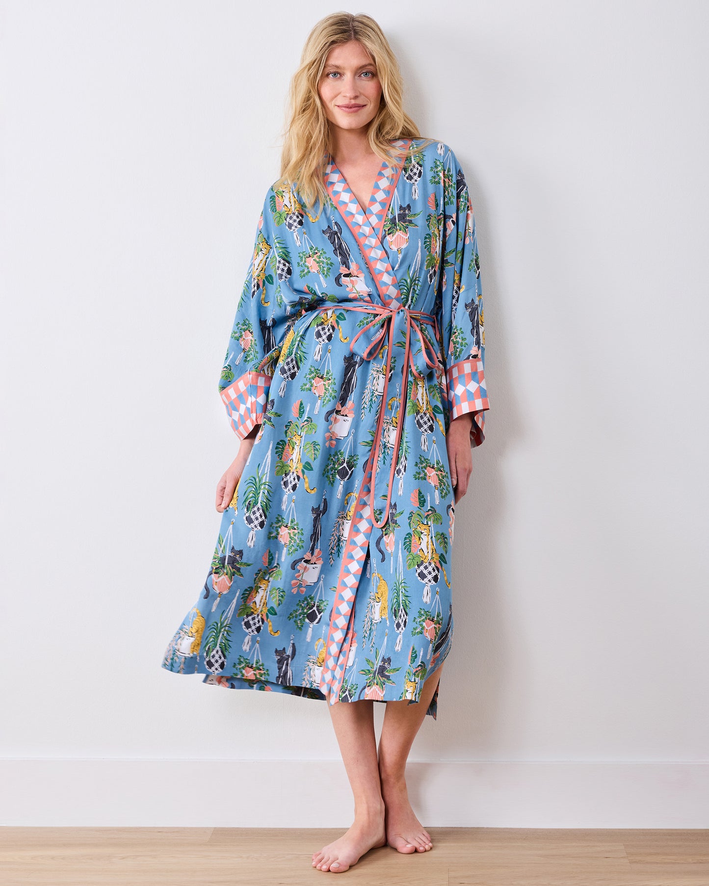 Full front view of the calf-length slate blue robe with tied belt and wide sleeves