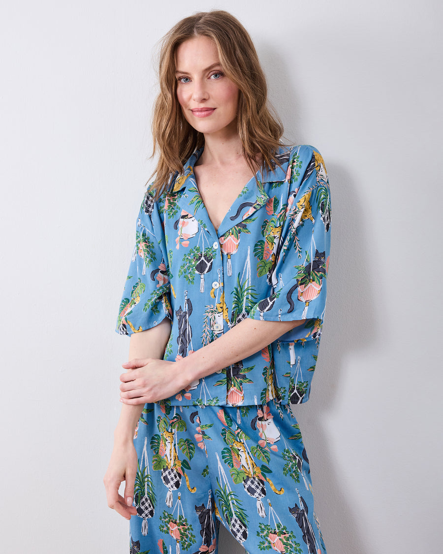 Front view of the slate blue pajama set with button-front top and wide-leg pants
