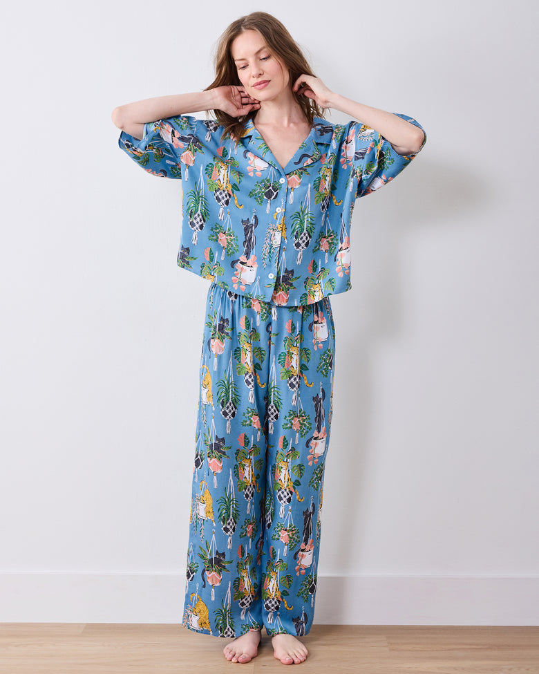 Full front view of the slate blue pajama set with button-front top and wide-leg pants