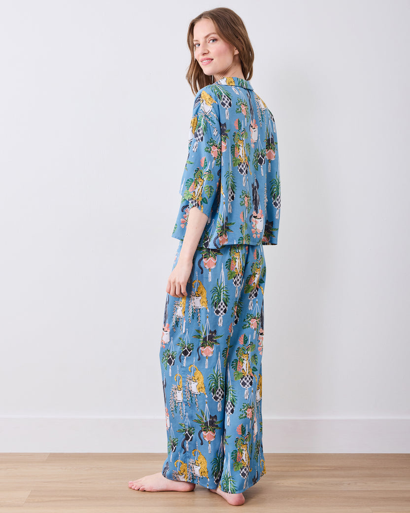 Full rear three-quarter view of the slate blue pajama set with wide-leg pants