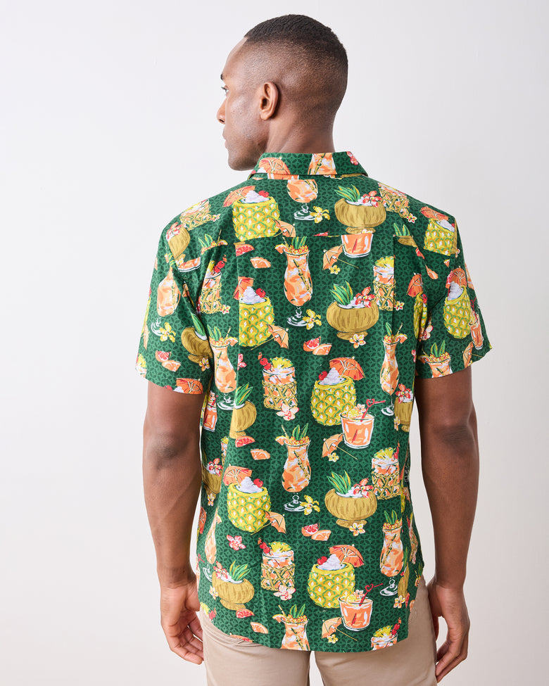 Back view of the emerald green short-sleeve shirt with an allover tropical drink print