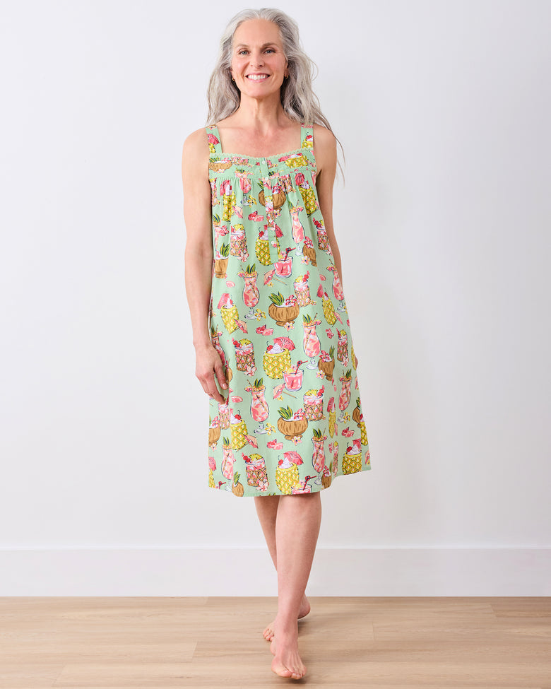 Front view of the Mojito nightgown with wide straps, button front, and tropical drink print