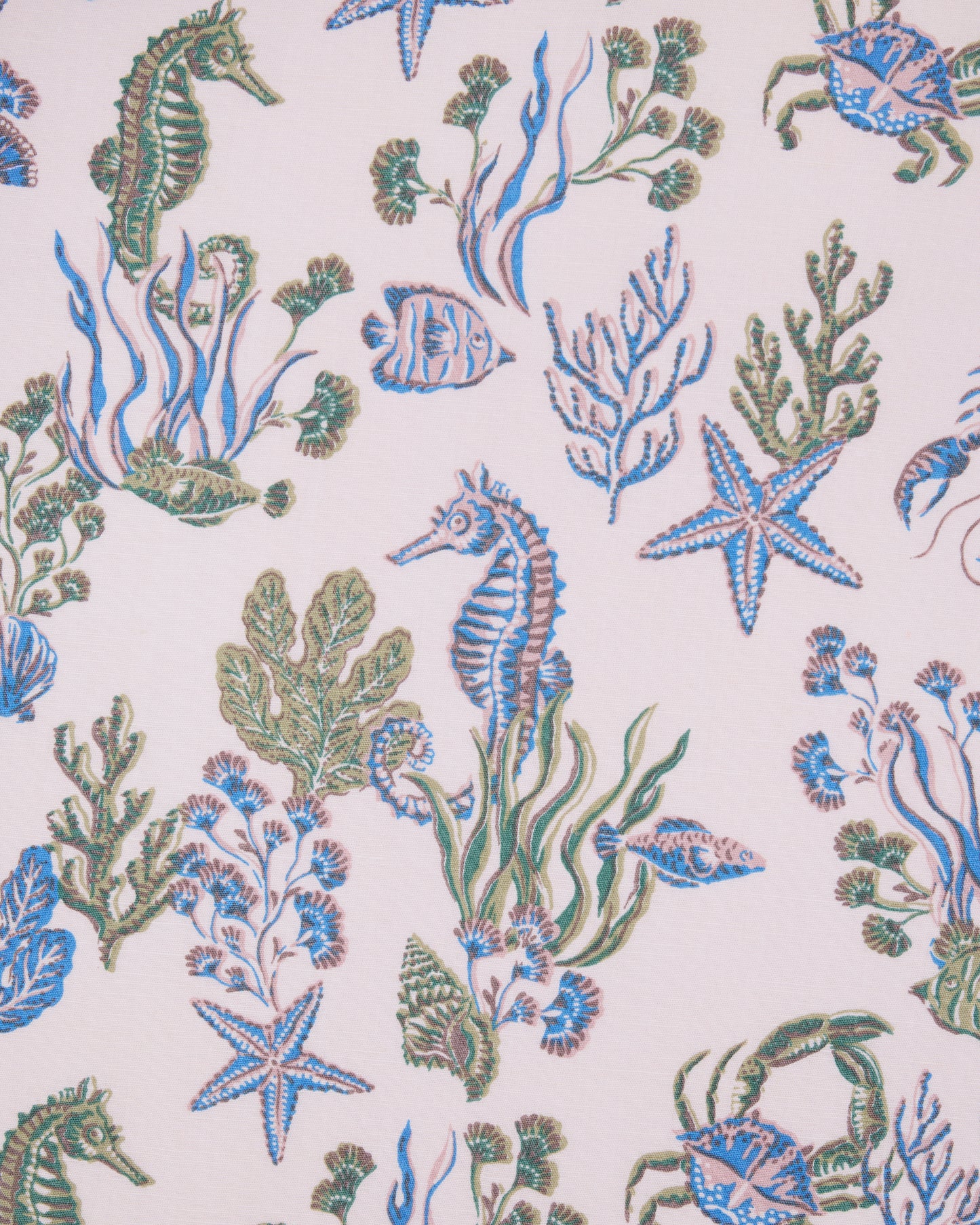 Saltwater Serenity print with seahorses, fish, starfish, crabs, coral, and sea plants on a pale background