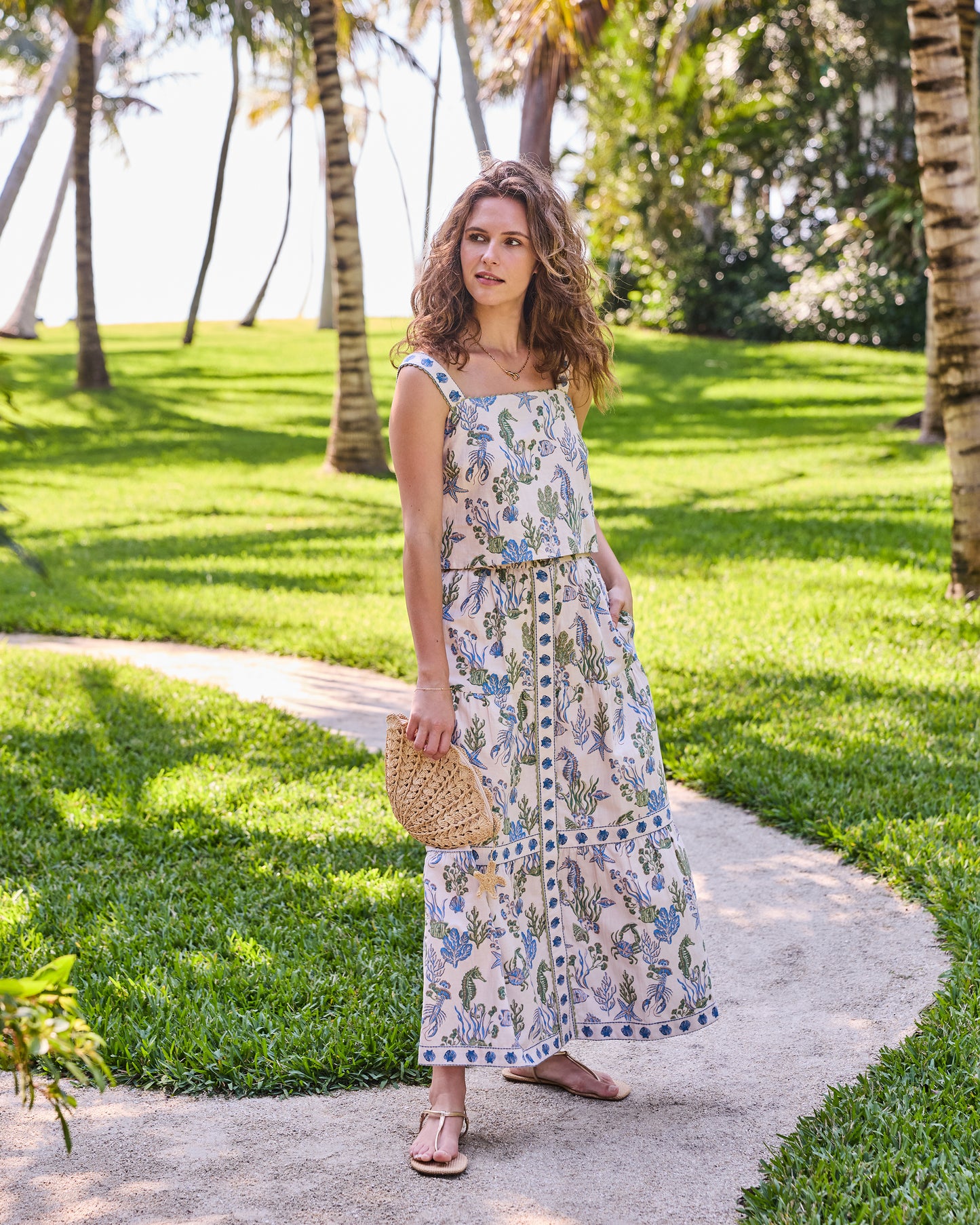 Full front view of the Saltwater Serenity Tessa Set with a sleeveless top and long button-front skirt in an underwater print