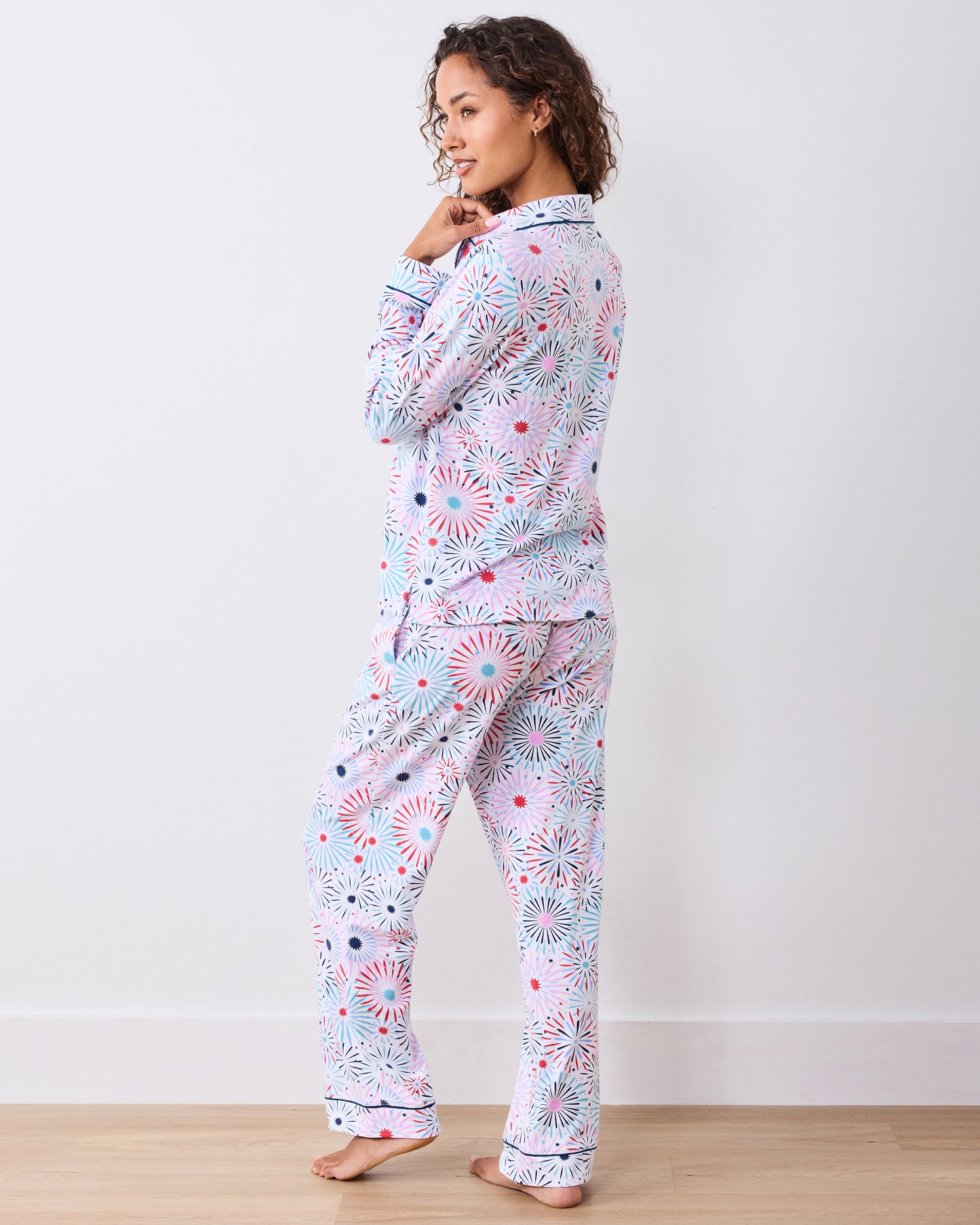 Back studio view of the fireworks-print long pajama set