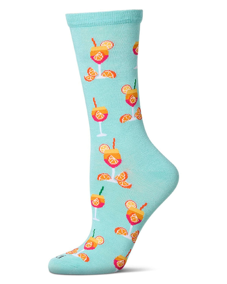 Capri breeze crew sock shown from the side, patterned with colorful cocktail glasses, citrus slices, and citrus wedges on a light blue background.