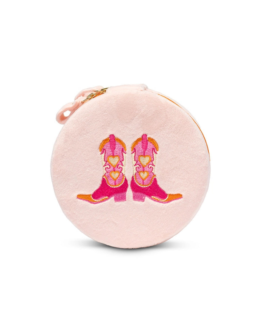Round pink jewelry zip case embroidered with a pair of pink cowboy boots with heart details.