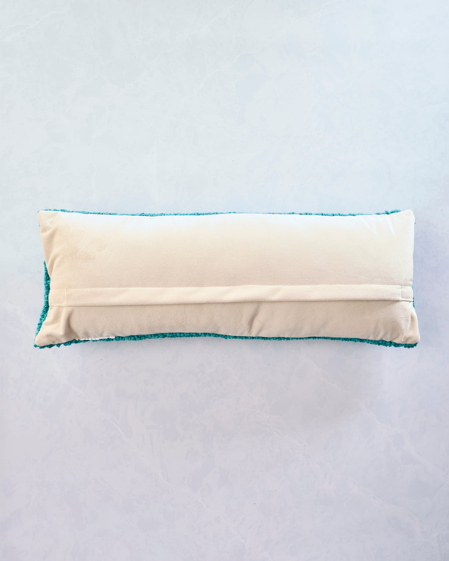 Back view of the trout lumbar pillow showing its beige backing and envelope-style closure.